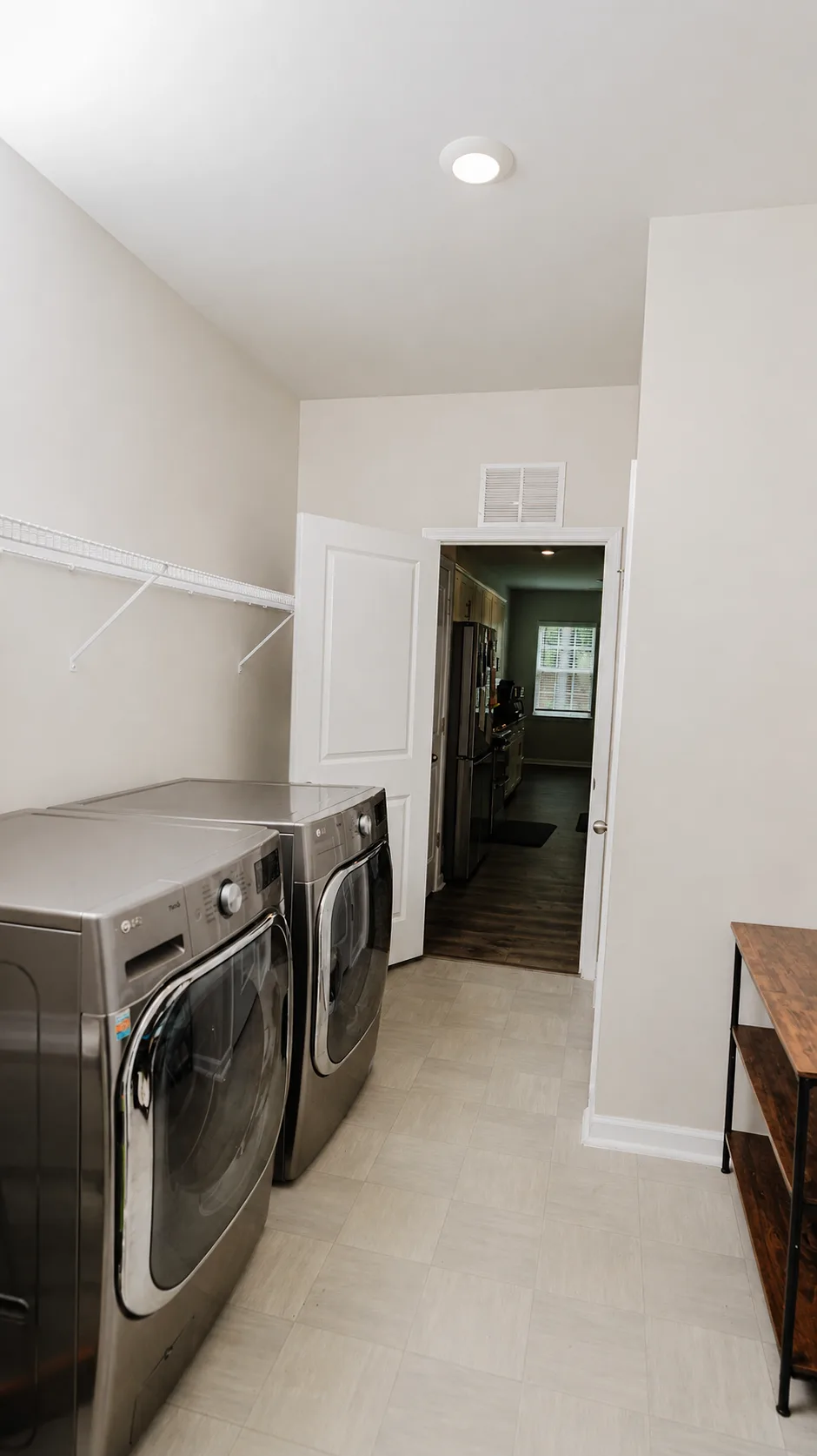 Laundry room at 222 Lothian with full-size washer and dryer