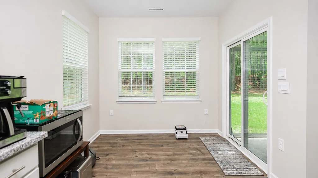 Breakfast nook at 222 Lothian with a sliding door to the backyard